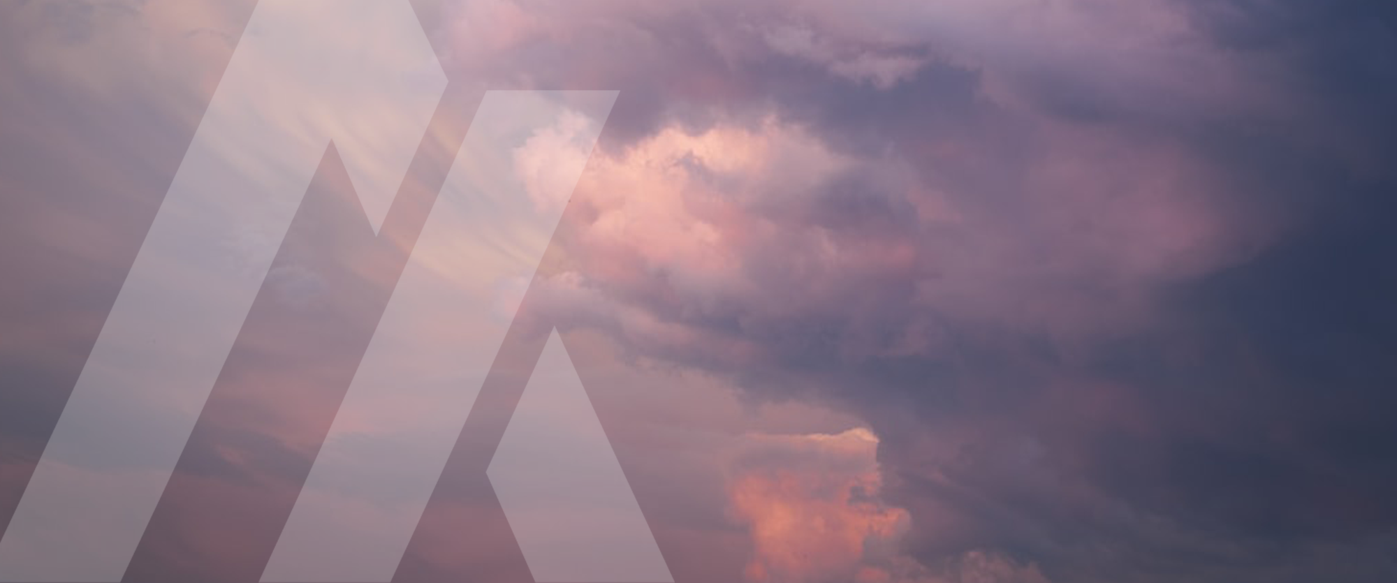 background showing clouds with purple sunset and ommax signet